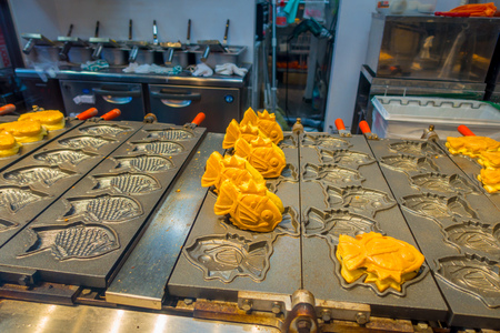 TOKYO, JAPAN JUNE 28 - 2017: Delicious magicarp cookies from pokemon over a metallic tray inside of a kitchen located in Akihabara district area, in Tokyoのeditorial素材