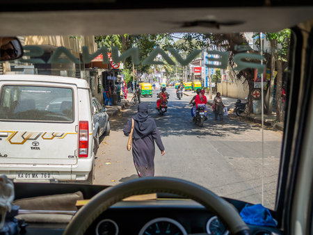 JAIPUR, INDIA - AUGUST 25 2017: Unidentified people walking and traveling in motorcycles in the...