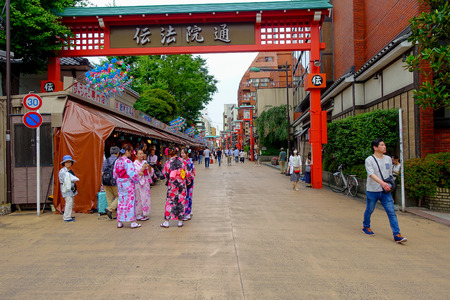 TOKYO, JAPAN JUNE 28 - 2017: Unidentified people walking in a stoned path near of the Buddhist Temple Sensoji in Tokyo, Japan. The Sensoji temple in Asakusa area is the oldest temple in Tokyoのeditorial素材