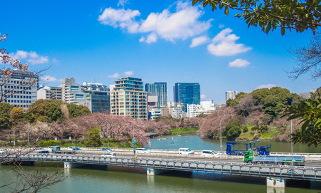 TOKYO, JAPAN - JULY 02, 2017: Car crossing the bridge in a beautiful sunny day with a gorgeous view of the city in the horizont in Tokyoのeditorial素材
