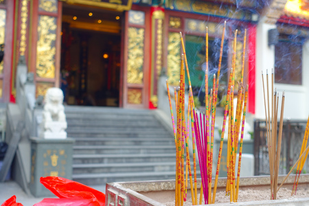 HONG KONG, CHINA - JANUARY 22, 2017: Close up of incenses burning up, inside of Wong Tai Sin Buddhist Temple to pray, in Hong Kong, China.のeditorial素材