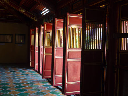 Hue, Vietnam - September 13 2017: Beautiful red wooden doors in Hue citadel, Vietnam, Asia. Famous...