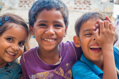 Jaipur, India - September 20, 2017: Portrait of beautiful group of children, smiling and playing in the street in Jaipur city in Indiaのeditorial素材