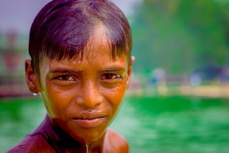 Delhi, India - September 16, 2017: Portrait of up of unidentified smiling indian boy looking at camera, in Delhiのeditorial素材