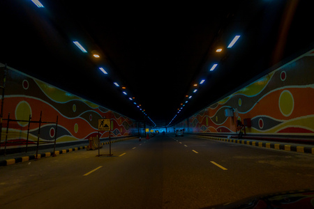 DELHI, INDIA - SEPTEMBER 19, 2017: Car crossing the tunnel to go to the International Airport of Delhi, Indira Gandhi International Airport is the 32th busiest in the worldのeditorial素材