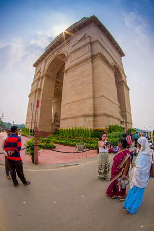 DELHI, INDIA - SEPTEMBER 19, 2017: Unidentified people walking in front of the India Gate, formerly known as the All India War Memorial at Rajpath, New Delhi in Indiaのeditorial素材