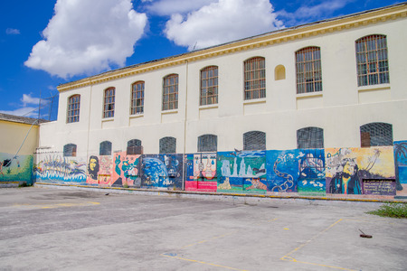 QUITO, ECUADOR - NOVEMBER 23, 2016: Art at backyard walls inside of the old prison Penal Garcia Moreno in the city of Quito. QUITO, ECUADOR - NOVEMBER 23, 2016: Art at backyard walls inside of the old prison Penal Garcia Moreno in the city of Quito.