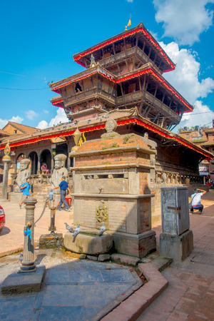 BHAKTAPUR, NEPAL - NOVEMBER 04, 2017: Unidentified people walking in ancient Hindu temple in the Durbar square in Bhaktapur, this is the city with more temples for area.のeditorial素材