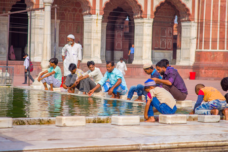 Delhi, India - September 27, 2017: Unidentified people clean themself in the courtyard of Jama Masjid Mosque in Delhi, Indiaのeditorial素材