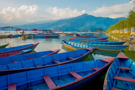 Pokhara, Nepal - September 04, 2017: Beautiful view of blue boats lakeshore in Pokhara city , Nepal.のeditorial素材