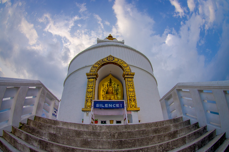 POKHARA, NEPAL, SEPTEMBER 04, 2017: Balanced on a narrow ridge high above Phewa Tal, the brilliant-white World Peace Pagoda in Pokhara is a massive Buddhist stupa, fish eye effectのeditorial素材