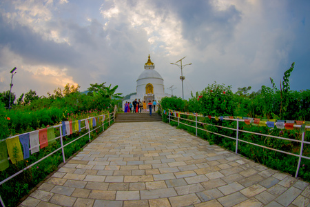 POKHARA, NEPAL, SEPTEMBER 04, 2017: Beautiful view of Phewa Tal, the brilliant-white World Peace Pagoda in Pokhara is a massive Buddhist stupaのeditorial素材