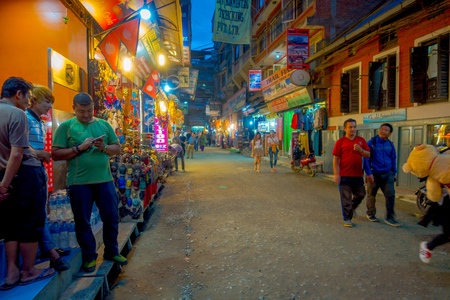 THAMEL, KATHMANDU NEPAL - OCTOBER 02, 2017: Night view of unidentified people walking and buying in the streets of Thamel. Thamel is a commercial neighbourhood in Kathmandu, the capital of Nepal. One of the popular tourist attraction in Kathmandu.のeditorial素材