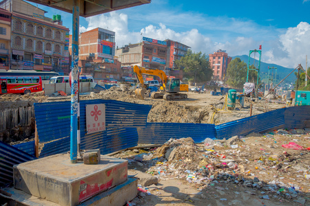 POKHARA, NEPAL OCTOBER 10, 2017: Outdoor view of heavy machinary working in the street of Pokhara, Nepalのeditorial素材