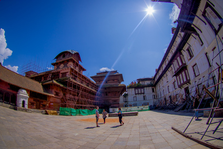 KATHMANDU, NEPAL OCTOBER 15, 2017: Unidentified people walking in the afternoon of Durbar square in Kathmandu, capital of Nepal in a beautiful blue sky in sunny day, fish eye effectのeditorial素材
