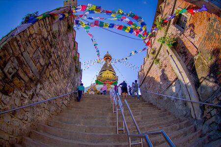 KATHMANDU, NEPAL OCTOBER 15, 2017: Stairs leading up to Swayambhu, an ancient religious architecture atop a hill west of Kathmandu city. It is also known as Monkey Templeのeditorial素材