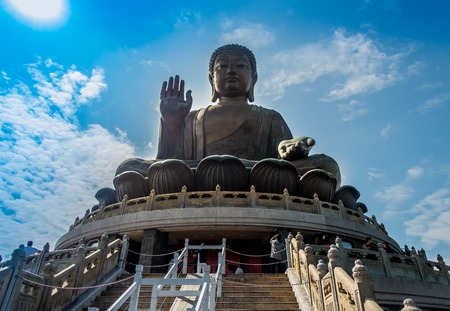 Beautiful huge buddha structure, with a blue skyの写真素材