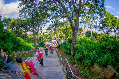 KATHMANDU, NEPAL OCTOBER 15, 2017: Stairs leading up to Swayambhu, an ancient religious architecture atop a hill west of Kathmandu city. It is also known as Monkey Templeのeditorial素材