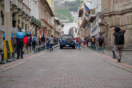 QUITO, ECUADOR NOVEMBER, 28, 2017: Unidentified people walking at historical center of old town Quito in northern Ecuador in the Andes mountains, Quito is the second highest capital city in the worldのeditorial素材