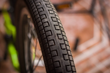 Close up of selective focus of the wheel of the bike in a workshop