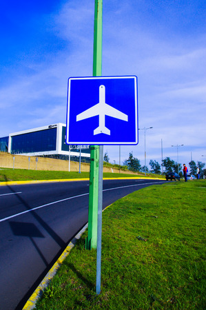Quito, Ecuador - November 23 2017: Informative sign of airport next, located aside of the street, in the city of Quitoのeditorial素材