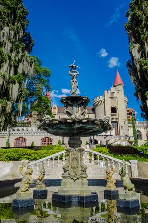 MEDELLIN, COLOMBIA OCTOBER 19, 2017: Close up of beautiful fountain in front of the beautiful gothic medieval Castle Museum in Medellin, Colombia, South Americaのeditorial素材