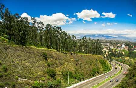 Aerial view of road in the mountains to visit the municipal dump in the city of Quito, Ecuadorの写真素材