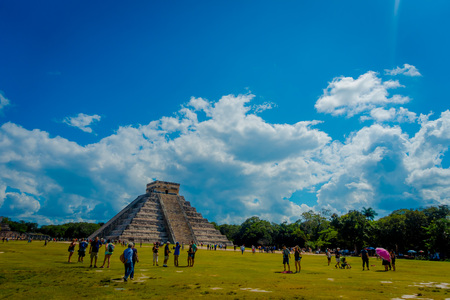 CHICHEN ITZA, MEXICO - NOVEMBER 12, 2017: Unidentified tourists visiting Chichen Itza, one of the new 7 wonders of the world thanks to the votes of millions of people worldwide on August 15, 2012 in Chichen Itza, Mexicoのeditorial素材