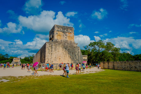 CHICHEN ITZA, MEXICO - NOVEMBER 12, 2017: Unidentified of tourists enjoying the view in the temple...