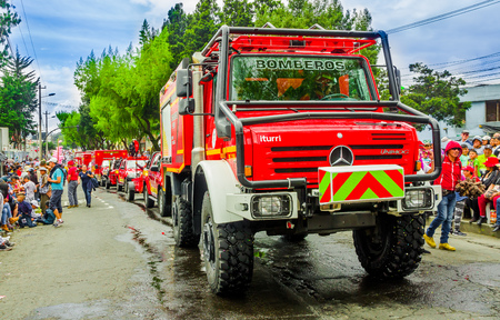 Quito, Ecuador - January 31, 2018: Outdoor view of a beautiful Mercedes Benz fire truck circuling in the streetss during a parade in the city of Quito, Ecuadorのeditorial素材