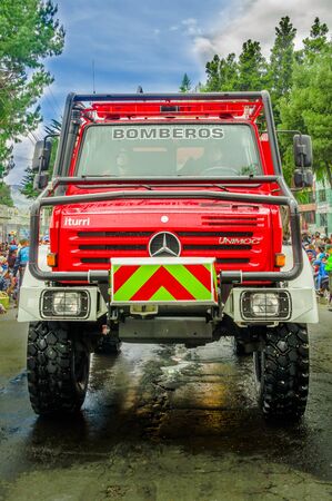 Quito, Ecuador - January 31, 2018: Outdoor view of a beautiful Mercedes Benz fire truck circuling in the streetss during a parade in the city of Quito, Ecuadorのeditorial素材