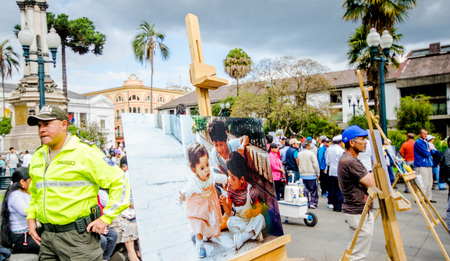 QUITO, ECUADOR, JANUARY 11, 2018: Close up of photographies over a wooden structure at outdoors in plaza grande with unidentified people during a protest in the city of Quito, demanding for an explanation of their relatives missingのeditorial素材