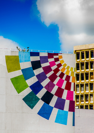 Quito, Ecuador - January 02, 2017: Outdoor view of a huge building with the colors of tourist production in a beautiful blue sky, located in the city of Quito, Ecuadorのeditorial素材