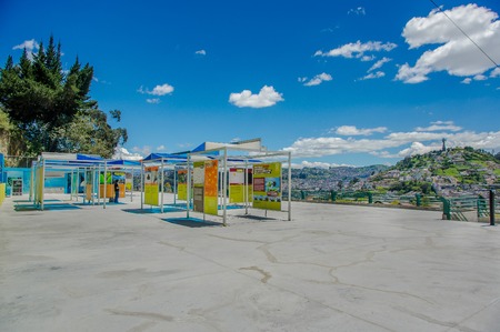 QUITO, ECUADOR, FEBRUARY 02, 2018: Outdoor view of informative adversisements in plastic structures of Yaku museum of water located in the city of Quito, with the city buildings in the horizontのeditorial素材