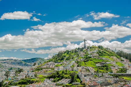QUITO, ECUADOR, FEBRUARY 02, 2018: High view of the city of Quito and some buildings, with Panecillo hill in the top of the mountainのeditorial素材