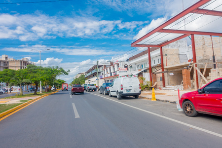 Playa del Carmen, Mexico - January 10, 2018: Outdoor view of some cars parked on 5th Avenue, the main street of the city. The city boasts a wide array of tourist activities due to its geographical location in the Riviera Maya.のeditorial素材