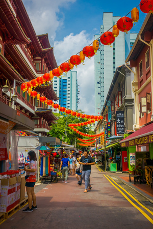 SINGAPORE, SINGAPORE - JANUARY 30. 2018: Outdoor view of unidentified people walking at public market The Lau Pa Sat festival market Telok Ayer is a historic Victorian cast-iron market building now used as a popular food court hawker center in Singaporeのeditorial素材