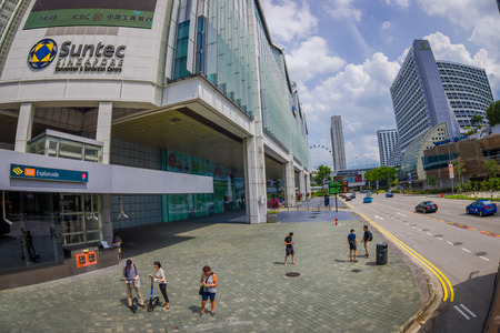 SINGAPORE, SINGAPORE - FEBRUARY 01. 2018: Outdoor view of unidentified people walking in the streets close to a conventions and exhibition centre in downtown at Kallang neighborhood in Singapore, fish eye effectのeditorial素材