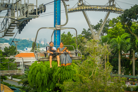 SINGAPORE, SINGAPORE - JANUARY 30, 2018: Outdoor view of unidentified people at Singapore Sentosa Cable Car and Skyline Luge, Singaporeのeditorial素材