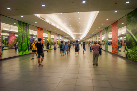 SINGAPORE, SINGAPORE - JANUARY 30, 2018: Unidentified people walking at Interior of Marina Bay Sands Shopping Mall in Singapore. Singapore is a global financial center with a tropical climate and multicultural populationのeditorial素材
