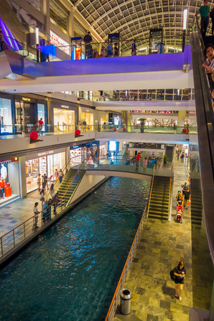 SINGAPORE, SINGAPORE - FEBRUARY 01, 2018: Unidentified people walking inside of the Marina Bay Sands in Singaporeのeditorial素材