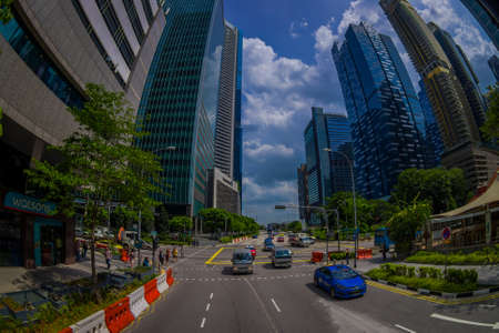 SINGAPORE, SINGAPORE - JANUARY 30. 2018: Outdoor view of public residential condominium building complex and downtown skylines at Kallang neighborhood with some cars in the streets of Singapore, fish eye effectのeditorial素材