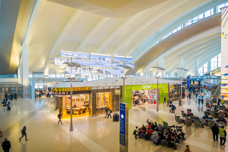 LOS ANGELES, EEUU, JANUARY, 29, 2018: Above view of unidentified people walking close to many stores inside of the airport of the Los Angeles International Airport LAX , the primary airport serving the Greater Los Angeles Areaのeditorial素材