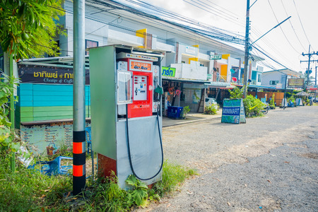 AO NANG, THAILAND - FEBRUARY 09, 2018: Outdoor view of rusted vending machine for petrol gasoline at Kanchanaburi, Thailandのeditorial素材