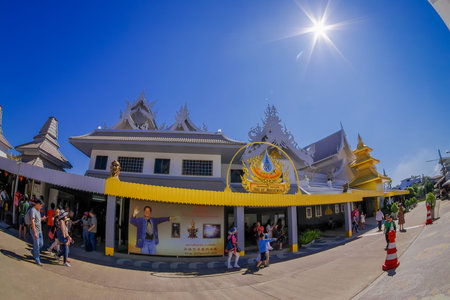 CHIANG RAI, THAILAND - FEBRUARY 01, 2018: Outdoor view of unidentified people walkingat the enter of white temple, in Chiang Maiのeditorial素材