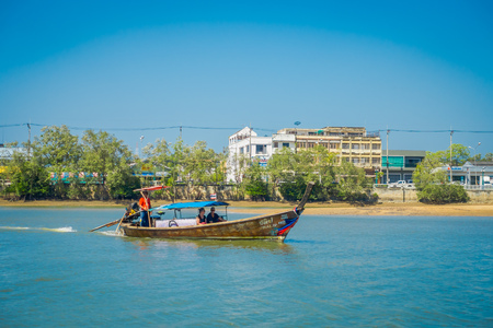 AO NANG, THAILAND - MARCH 05, 2018: Outdoor view of unidentified people traveling in Fishing thai boats in the river at Krabi Province, Andaman Sea, South of Thailandのeditorial素材