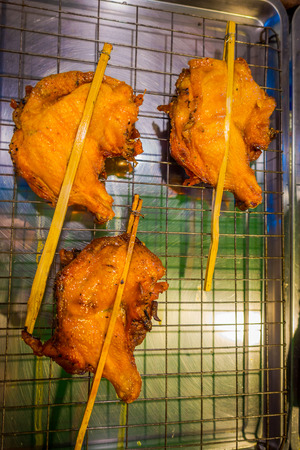 Close up of chicken grilled located at Street food stalls on Nopparat Thara Road in AO NANGの写真素材