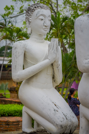 Close up of praying ancient Buddha Statue at WAT YAI CHAI MONGKOL, The Historic City of Ayutthaya, Thailandの写真素材