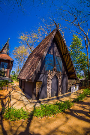 Outdoor view of many houses in Baan Dam museum, the Black House in Chiang Rai Thailandの写真素材