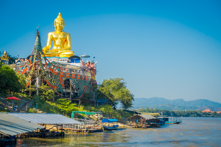 Beautiful outdoor view of golden budha located at golden triangle Laosの写真素材